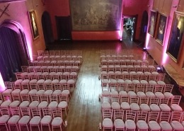 Wedding Ceremony uplighters and chivari chairs at cowdray house bucks hall