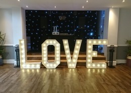 4ft LOVE and black starcloth at hilton avisford