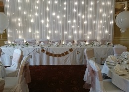 top table light up twinkle backdrop at hilton avisford ballroom 1